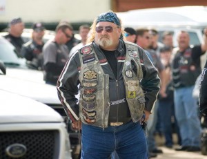 Staff photo by Evan Lewis Gene “CUDA” Leslie of Texarkana, Texas, vice president of the Texarkana, Texas, chapter of the Bikers Against Child Abuse, stands outside the federal courthouse in Texarkana, Ark. About 35 BACA members from four states attended the sentencing of Tony Alamo.